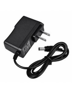 Adaptador SAT PS12VDC2A junto a su caja: entrada 100-240VAC, salida 12VDC 2A 2